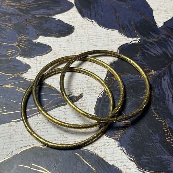 Unsigned Jewelry - Set of 3 Vintage Brass Tone Etched Floral Bangles